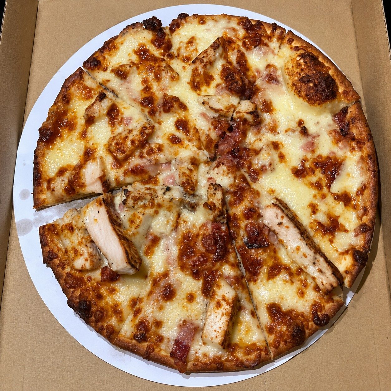 Bacon Chicken Alfredo Pizza.